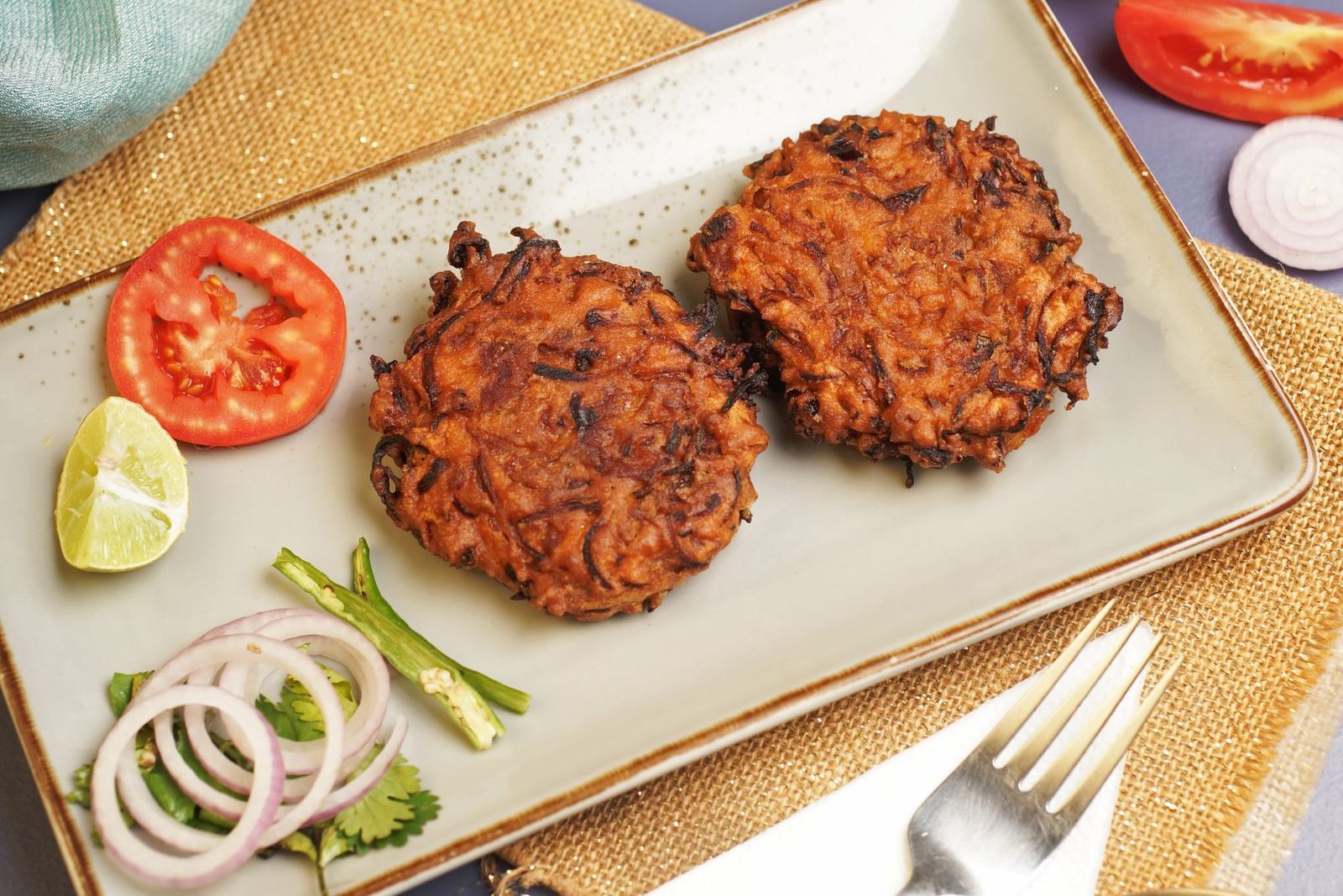 Golden vegetable fritters on a plate